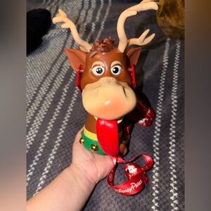 Festive Reindeer Toy with Red and Brown Accents